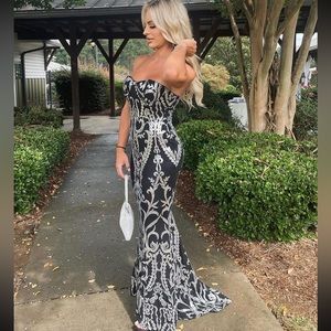 Black and silver sequin dress. Can be used for any special event.